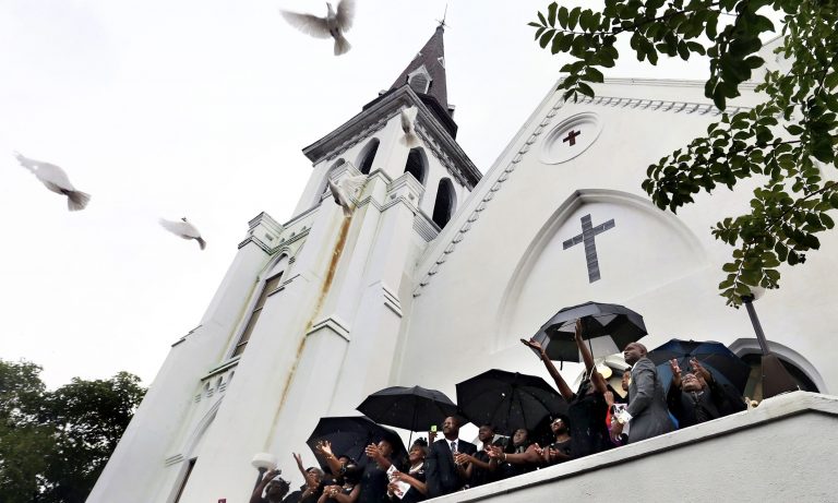 Rev. DePayne Middleton Doctor's four daughters and other family members released nine doves from Emanuel AME Church following her funeral. Rev. Doctor was one of nine people fatally shot during a Bible study at the church on June 17. Wade Spees/Staff June 28, 2015
